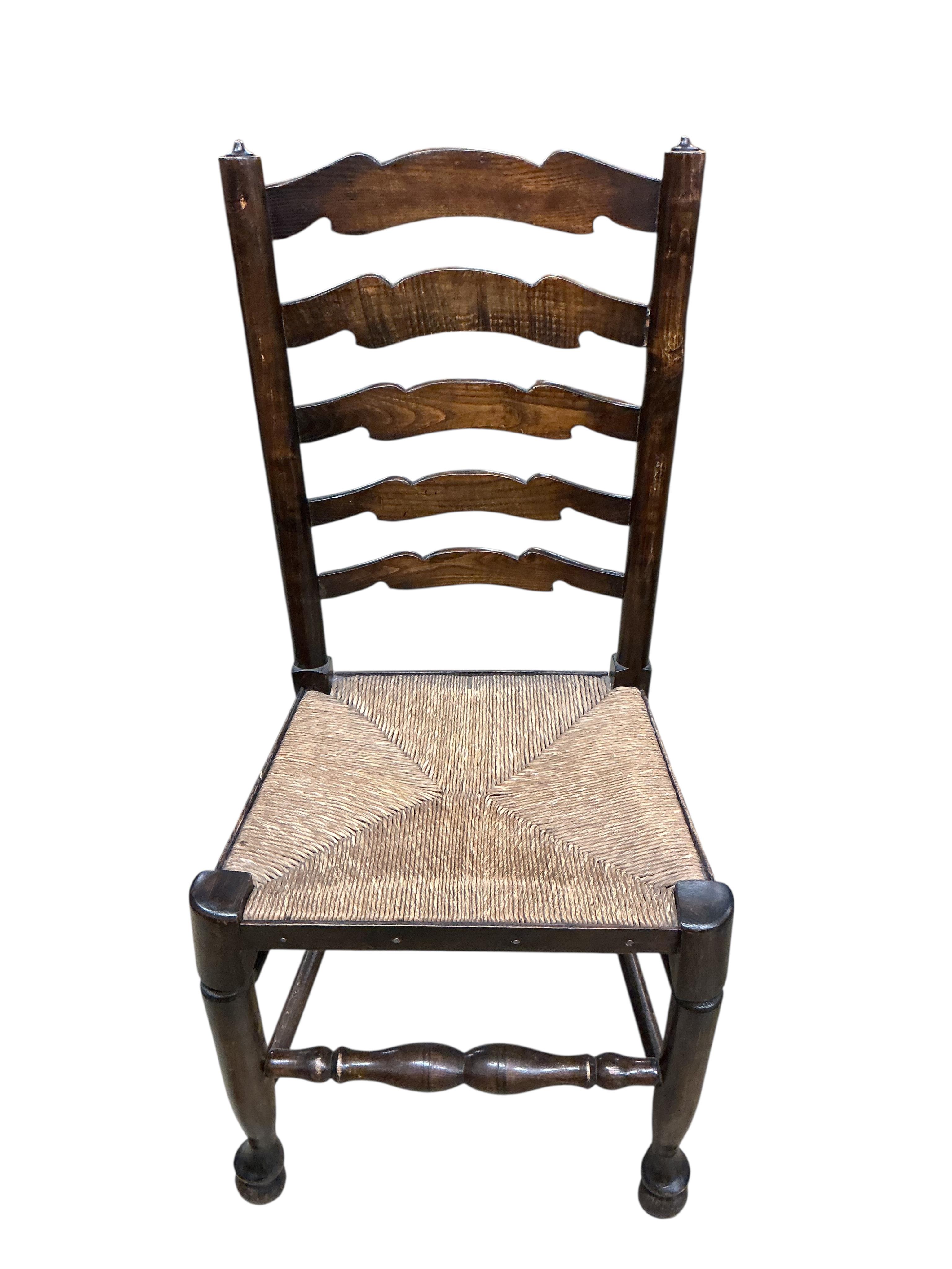 A set of six Lancashire style elm and beech rush seat ladder back dining chairs, width 41cm, height 100cm